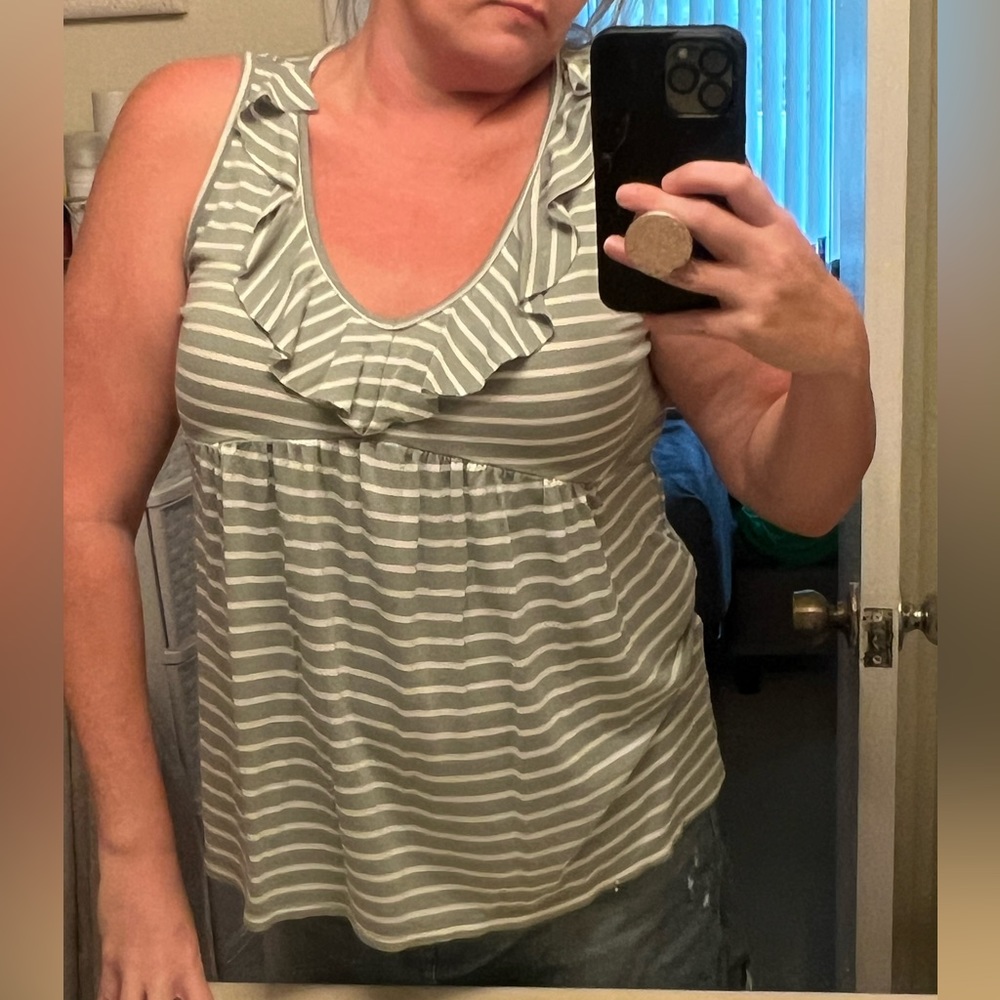 Boutique bought size large sage green/off white tank with flowy neckline.